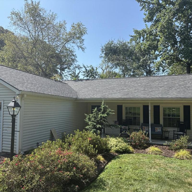 Architectural asphalt shingle roof on ranch home Architectural asphalt shingle roof on ranch home