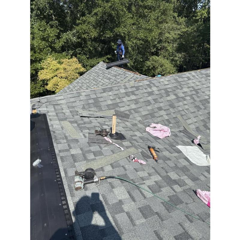 Architectural asphalt shingles installation on roof Architectural asphalt shingles installation on roof