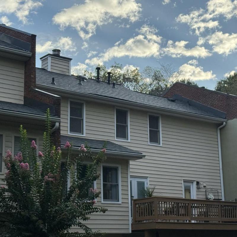 Architectural asphalt shingle roof on townhomes Architectural asphalt shingle roof on townhomes