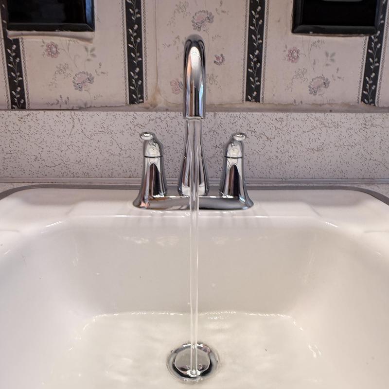 Bathroom faucet with running water and drain Bathroom faucet with running water and drain
