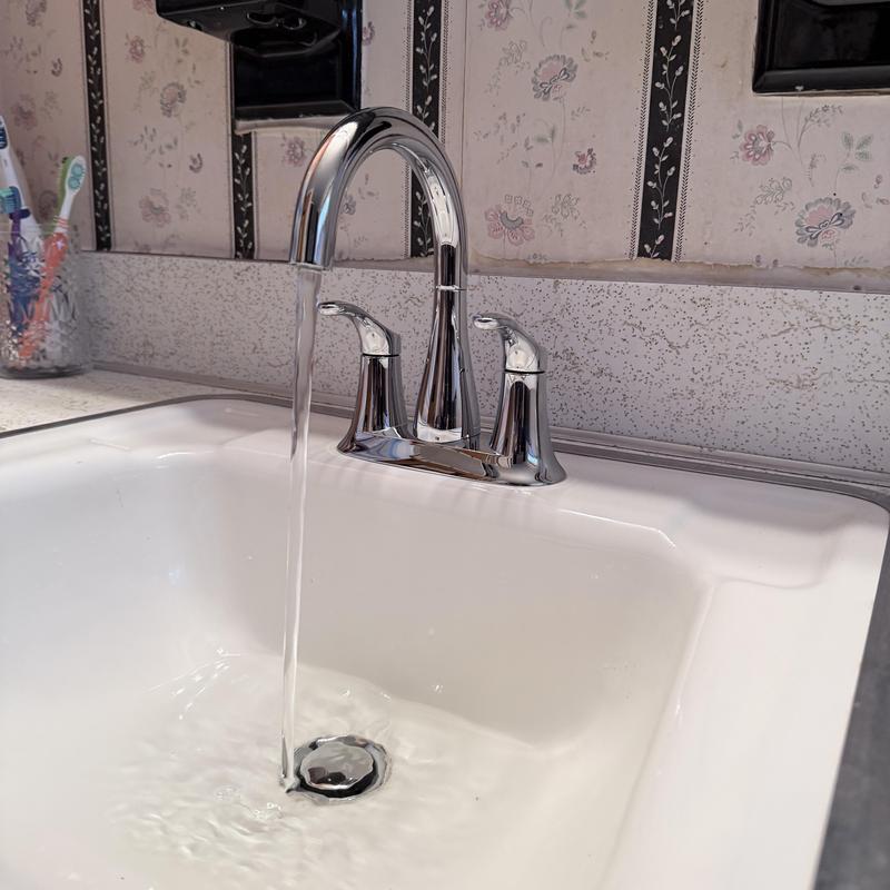 Bathroom faucet and drain with running water Bathroom faucet and drain with running water