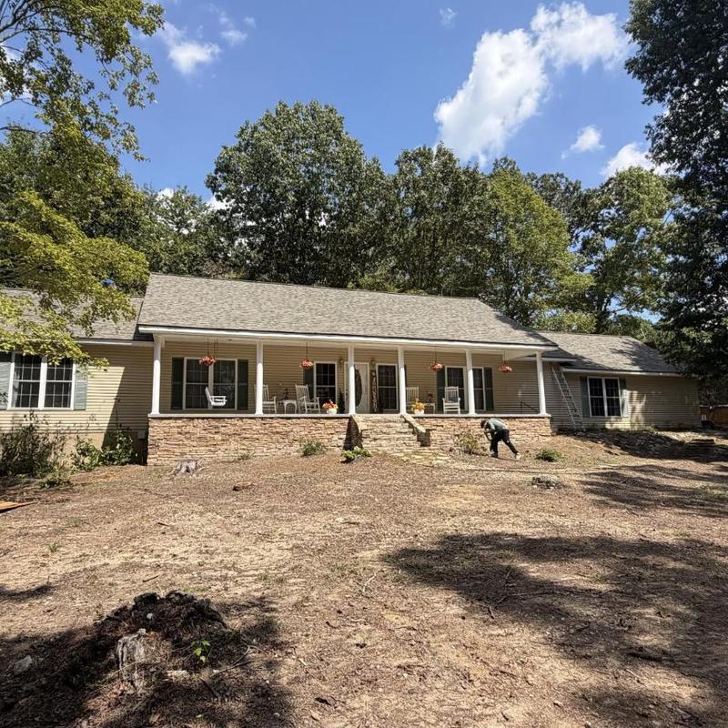 Architectural asphalt shingle roof on ranch home Architectural asphalt shingle roof on ranch home