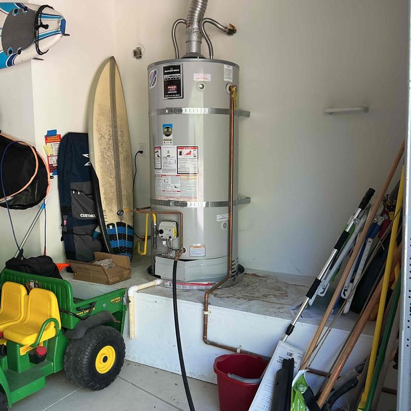 Water heater with flushing and inspection setup