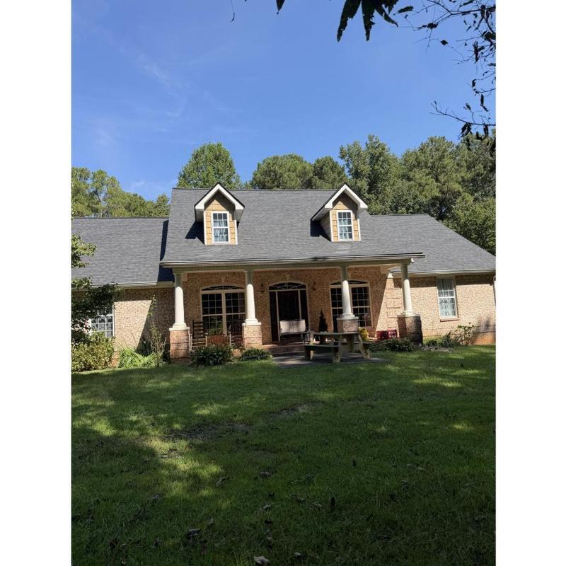 Architectural asphalt shingle roof on brick home Architectural asphalt shingle roof on brick home
