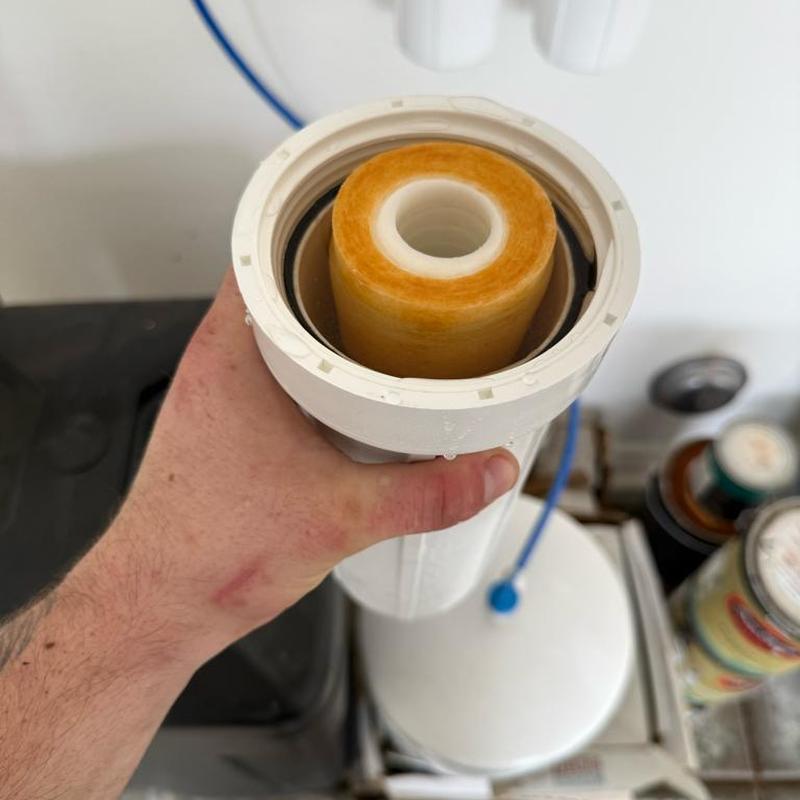 RO system filter canister replacement close-up