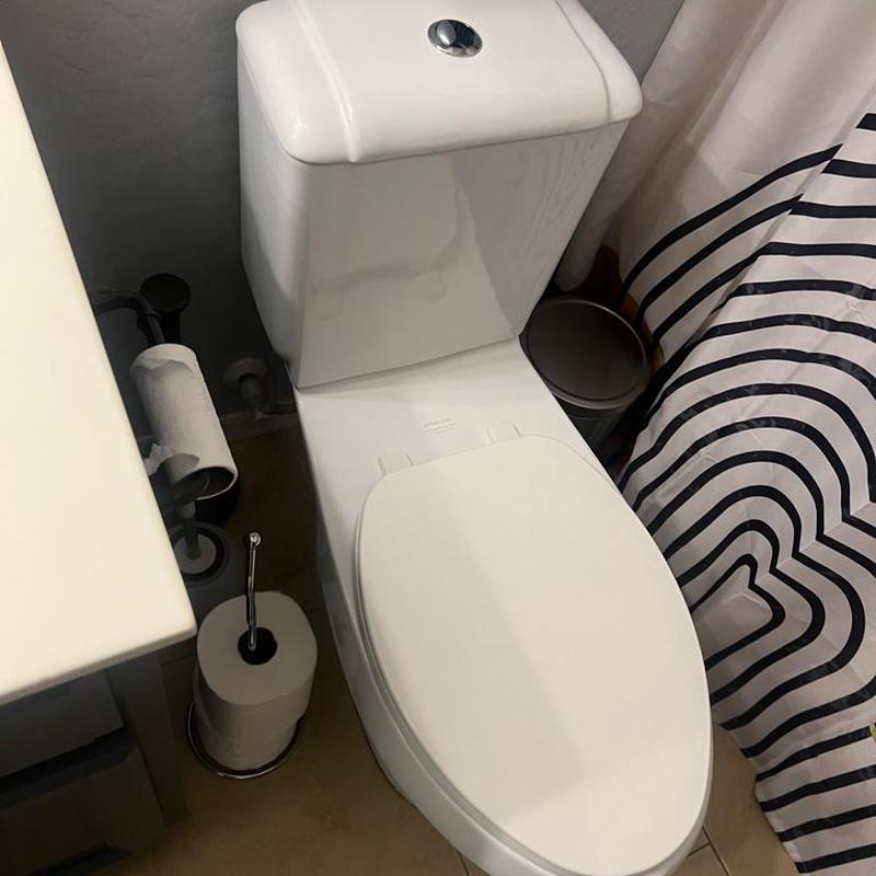 Toilet installation with wax ring and caulking completed