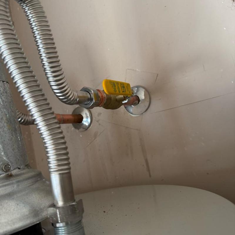 Water heater shut off valve with flex lines in place