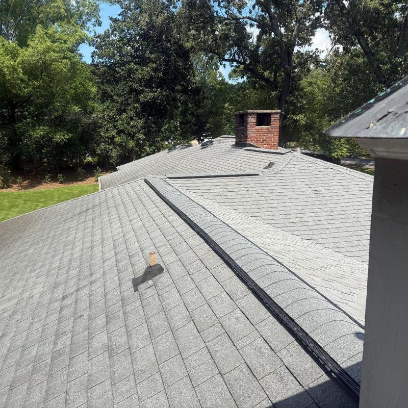 Roof ridge and vents with new shingles and cap Roof ridge and vents with new shingles and cap