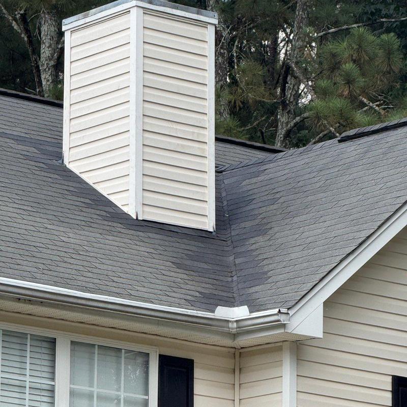 Shingle roof repair around chimney and gutter corner Shingle roof repair around chimney and gutter corner