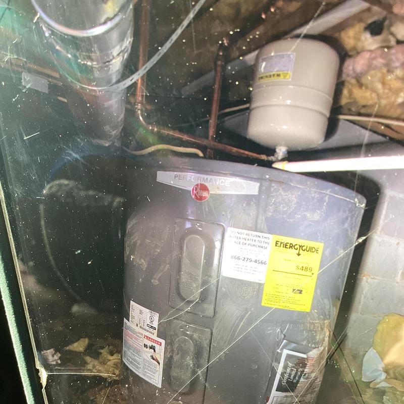 Electric water heater with expansion tank in crawlspace Electric water heater with expansion tank in crawlspace