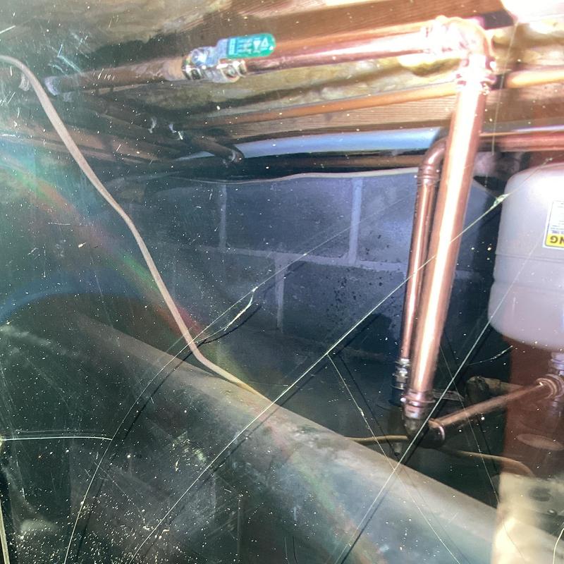 Electric water heater piping and expansion tank in crawl space Electric water heater piping and expansion tank in crawl space
