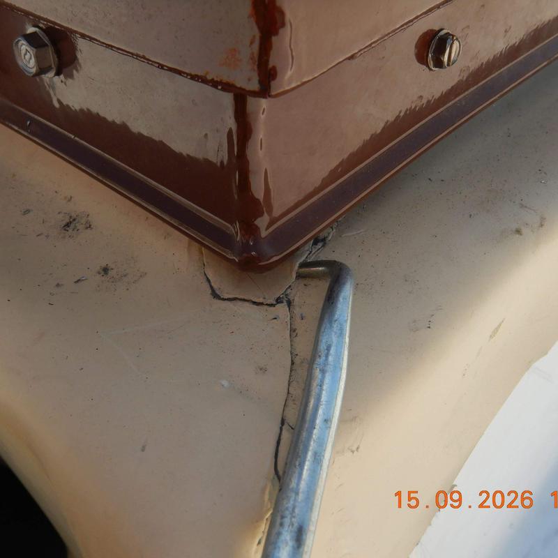 Metal roof flashing with rust and cracks close-up Metal roof flashing with rust and cracks close-up