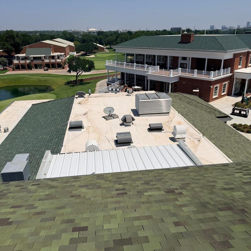 Commercial flat roof with HVAC vents and skylights Commercial flat roof with HVAC vents and skylights