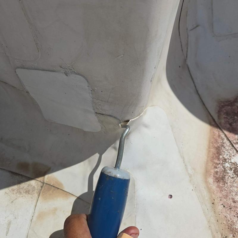 Commercial roof membrane seam with cold-weld repair tool Commercial roof membrane seam with cold-weld repair tool