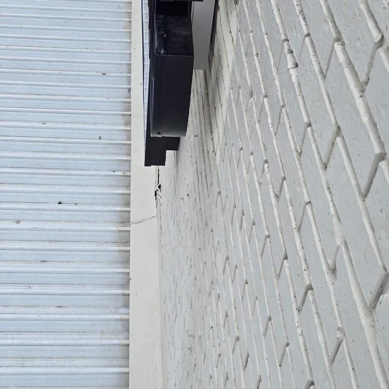 Awning flashing and attachment points on brick wall Awning flashing and attachment points on brick wall
