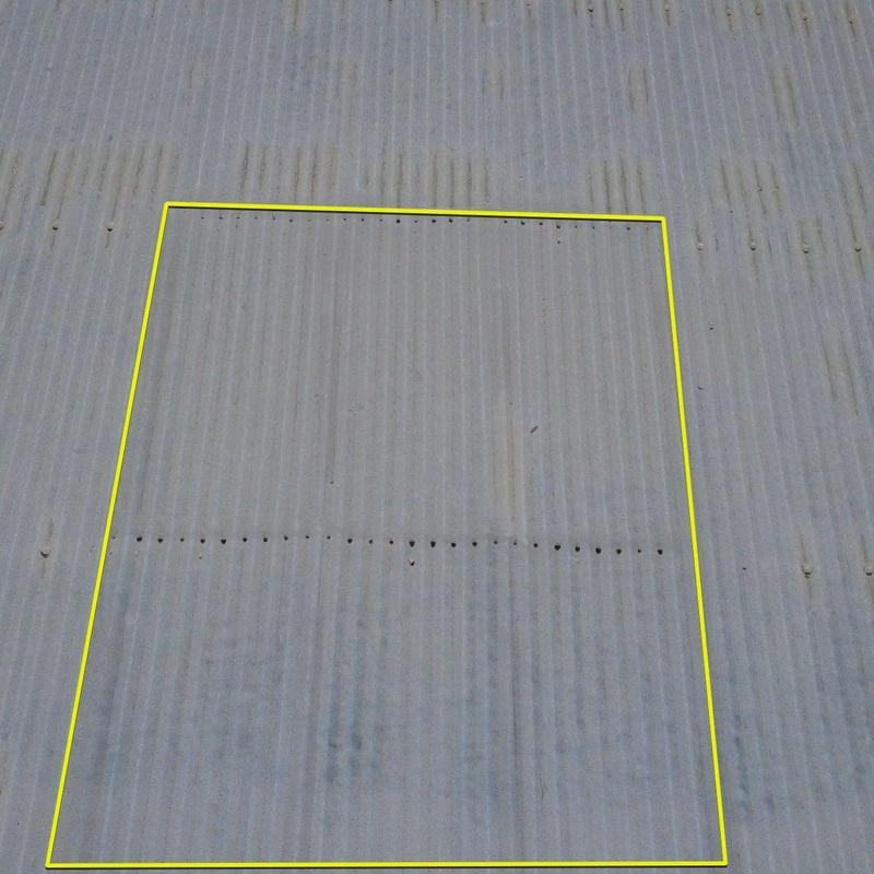 Corrugated metal roof panel with inspection markings Corrugated metal roof panel with inspection markings