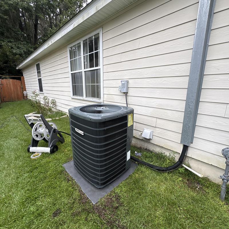 Central air conditioner unit with hose and wiring