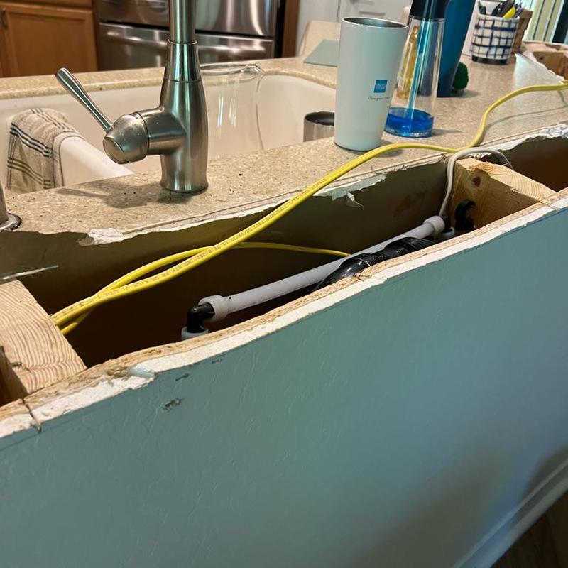 Boston loop vent and waterline rerouted under countertop