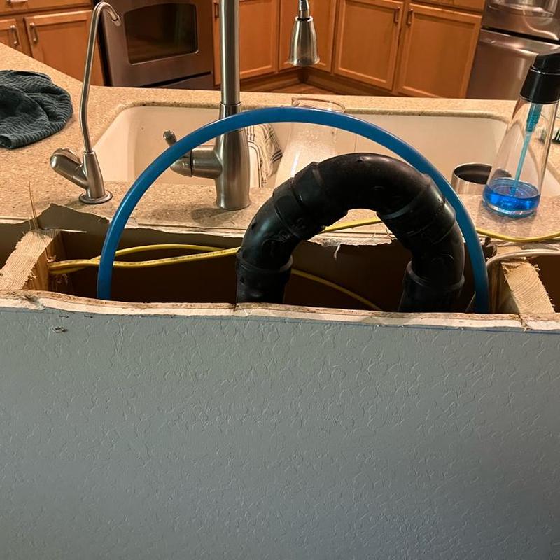 Boston loop vent and waterline reroute in kitchen
