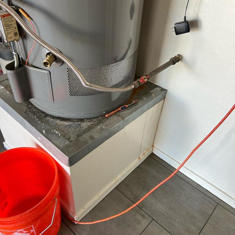 Gas water heater installation with new vent hood