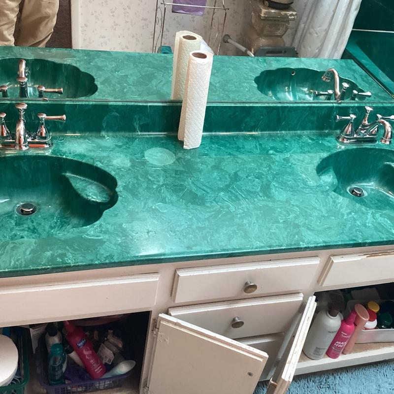 Double vanity faucets with replaced cartridges and seats Double vanity faucets with replaced cartridges and seats