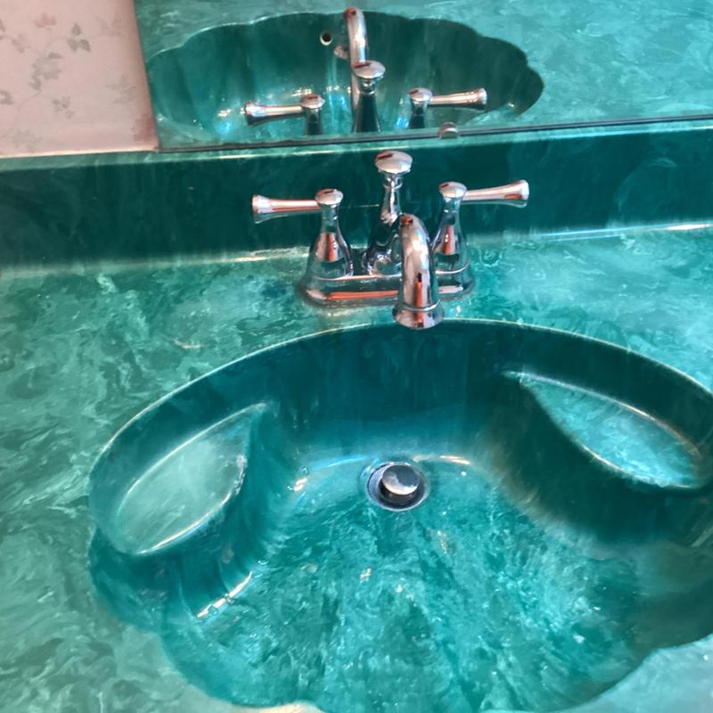 Double vanity faucet with chrome handles and spout Double vanity faucet with chrome handles and spout