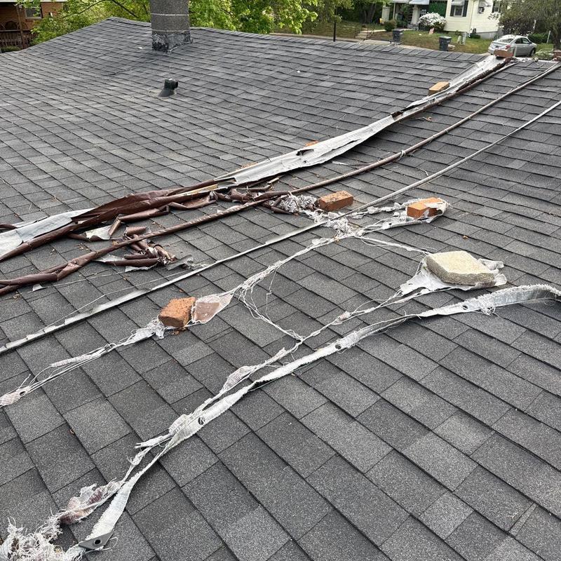 Roof flashing strips damaged and deteriorated on shingle roof