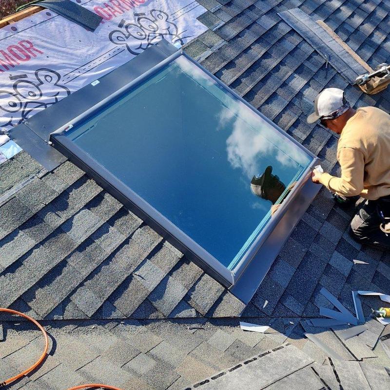 Skylight installation on asphalt shingle roof Skylight installation on asphalt shingle roof