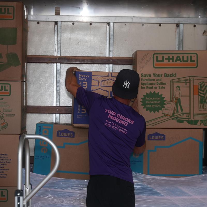 Moving boxes inside moving truck during local move