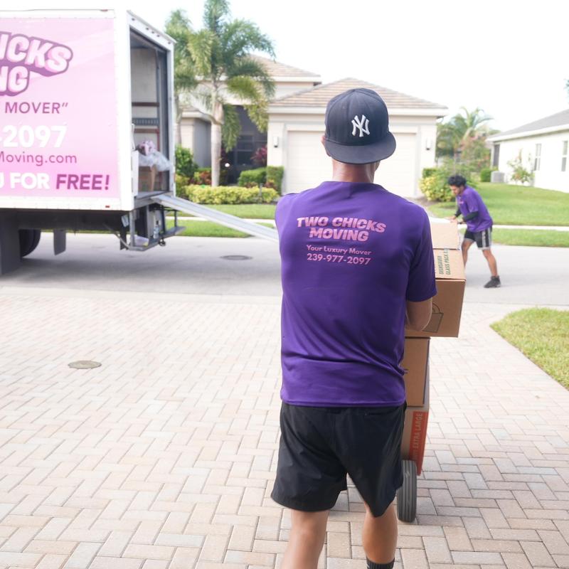 Moving boxes loaded onto dolly for local residential move