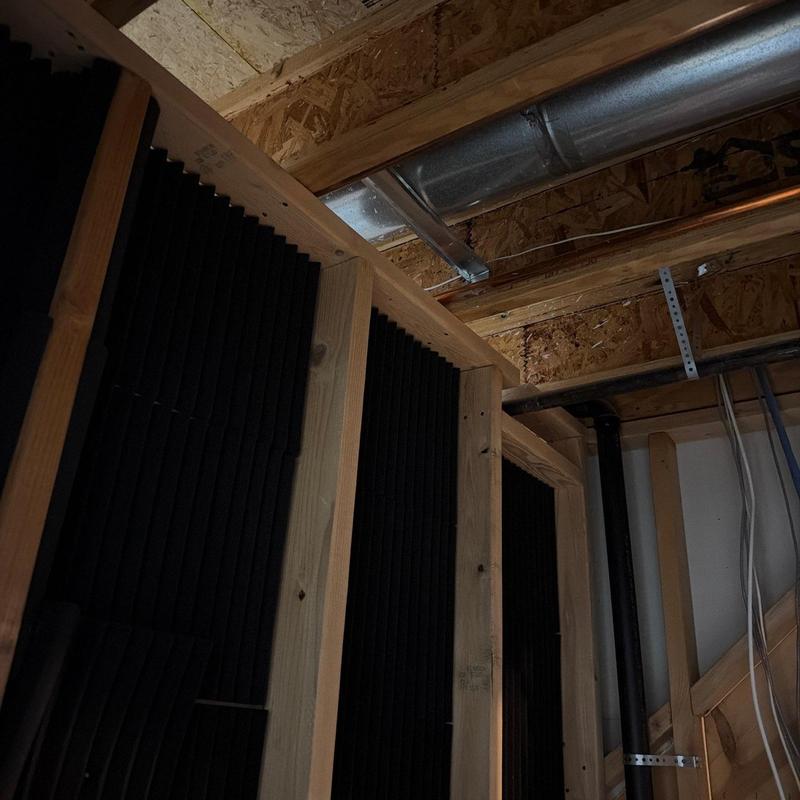 Ductwork installation in ceiling framing with insulation panels