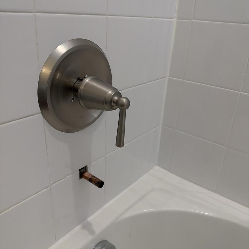 Shower valve and handle with exposed pipe riser