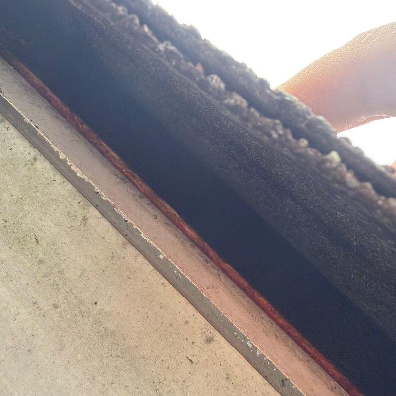 Roof flashing close-up showing seam and sealant detail