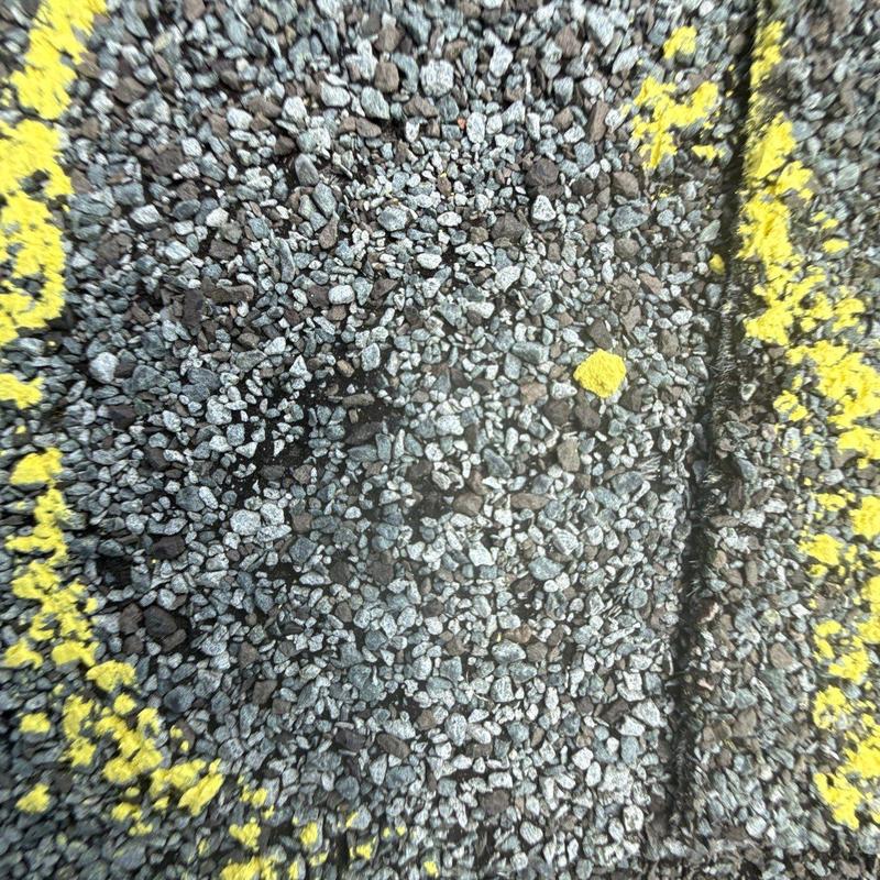Roofing granule loss with yellow chalk markings