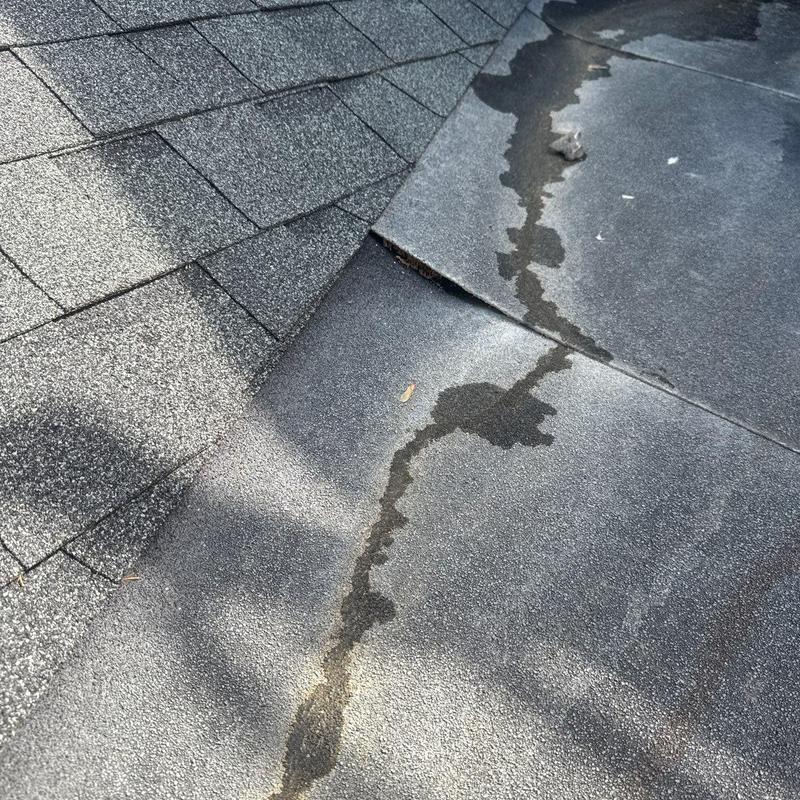 Roof flashing with water damage and potential leaks