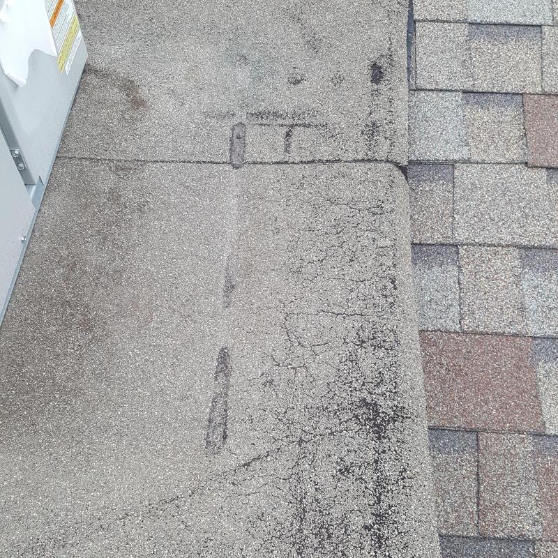 Modified bitumen roof surface with wear and damage signs Modified bitumen roof surface with wear and damage signs