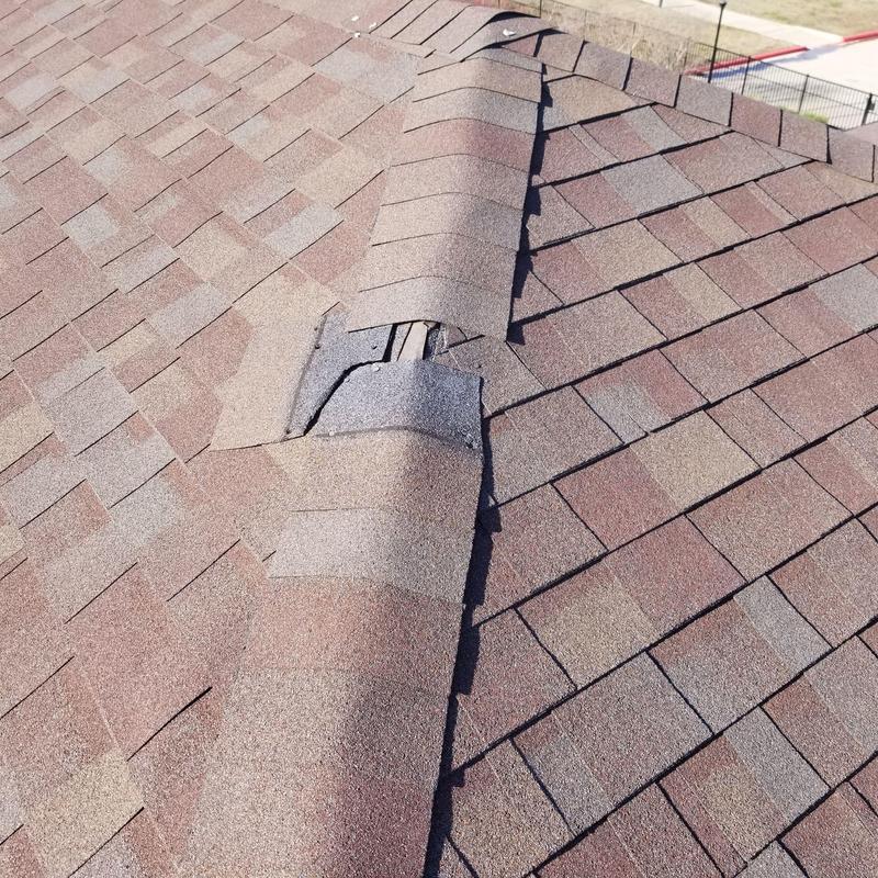 Asphalt shingle ridge cap with exposed underlayment Asphalt shingle ridge cap with exposed underlayment