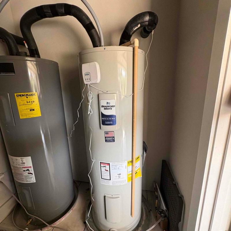 Electric water heater installation with code upgrades