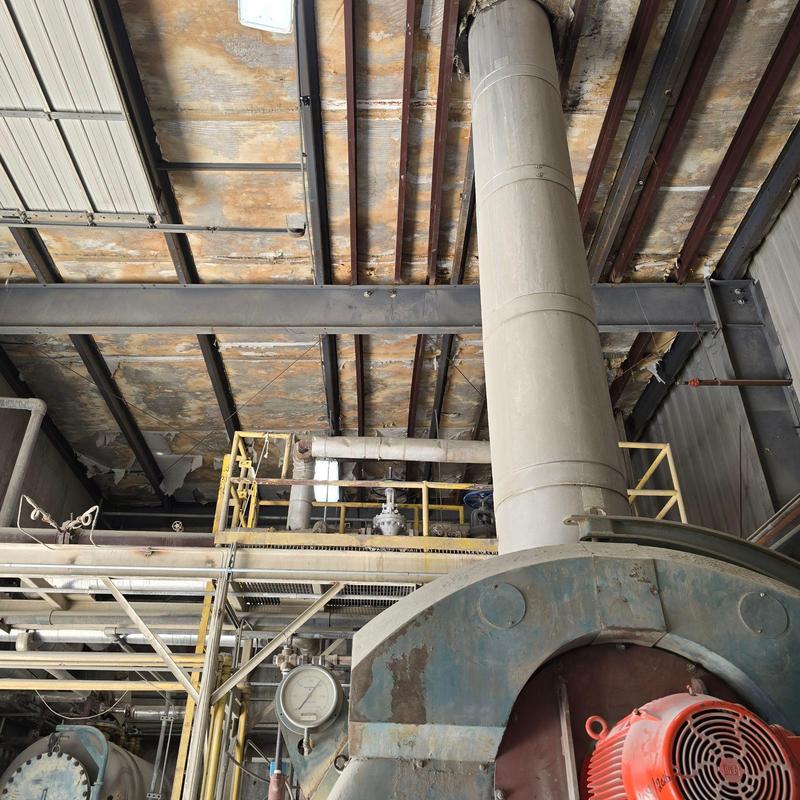 Boiler room chimney and industrial pipes with gauge Boiler room chimney and industrial pipes with gauge
