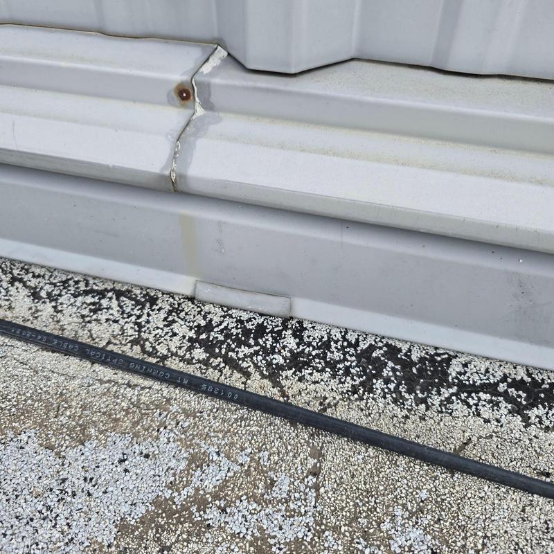 Metal roofing panel seam with rust and sealant Metal roofing panel seam with rust and sealant