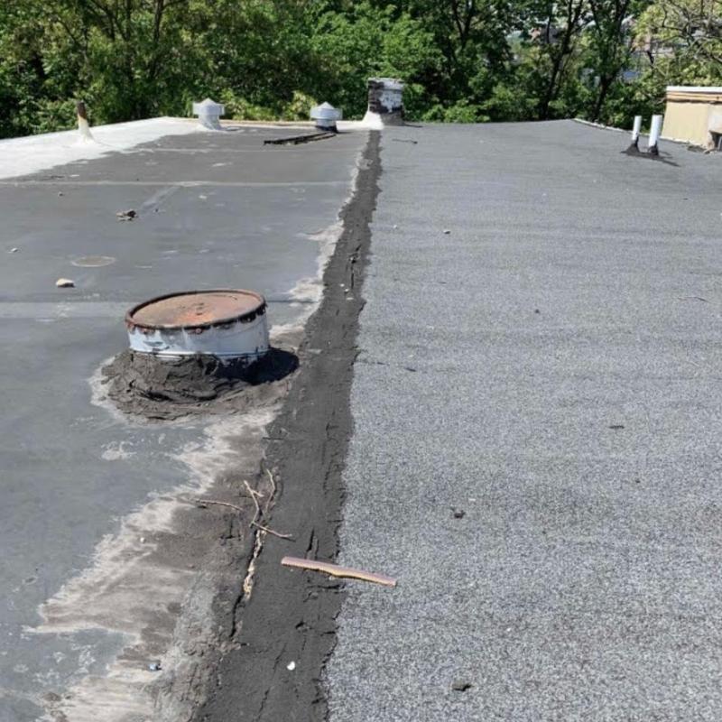EPDM to rolled roofing transition inspection on flat roof EPDM to rolled roofing transition inspection on flat roof