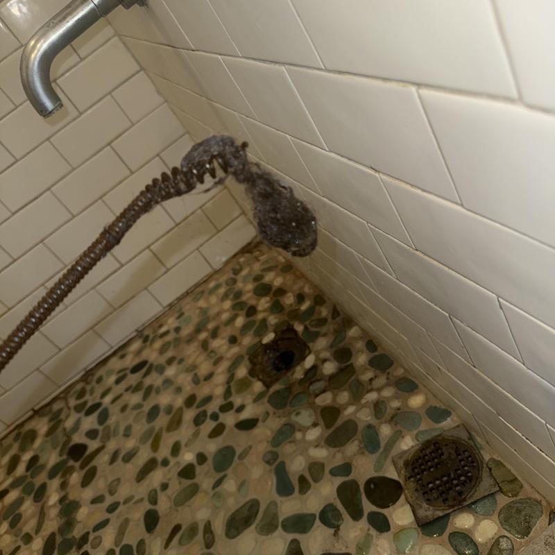 Tub secondary drain line with clog buildup in Fairfield NJ Tub secondary drain line with clog buildup in Fairfield NJ