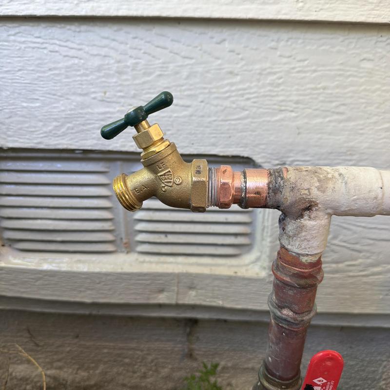 Brass hose bib with soldered adapter on copper pipe Brass hose bib with soldered adapter on copper pipe