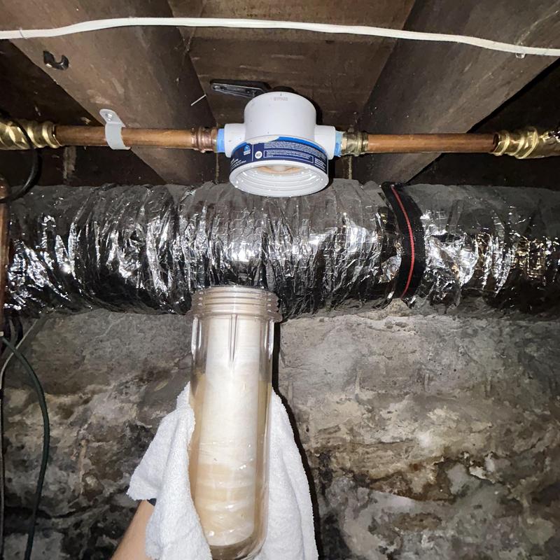 Whole house water filter housing removed in basement Whole house water filter housing removed in basement