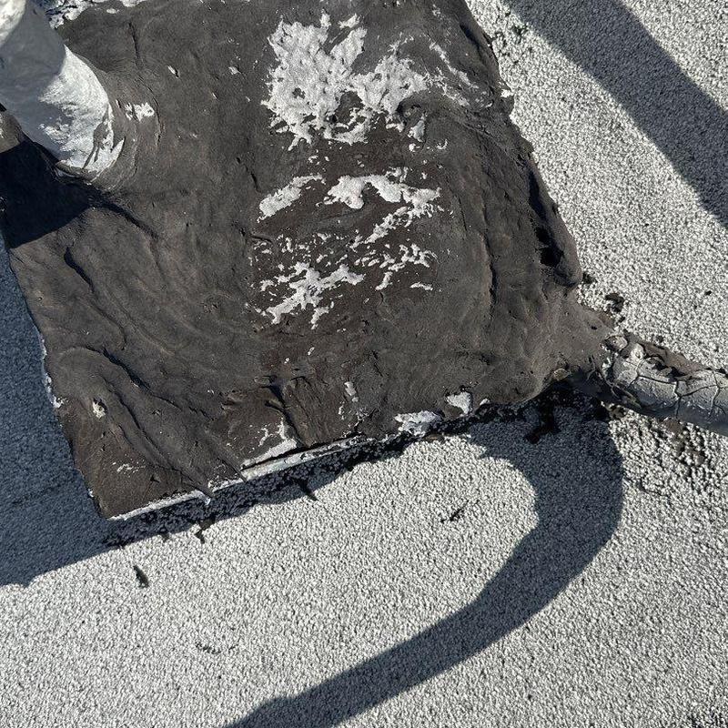 Roof flashing with deteriorated sealant on commercial roof Roof flashing with deteriorated sealant on commercial roof