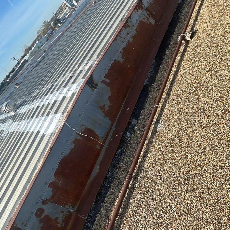 Metal roofing panels with rust and sealant inspection Metal roofing panels with rust and sealant inspection