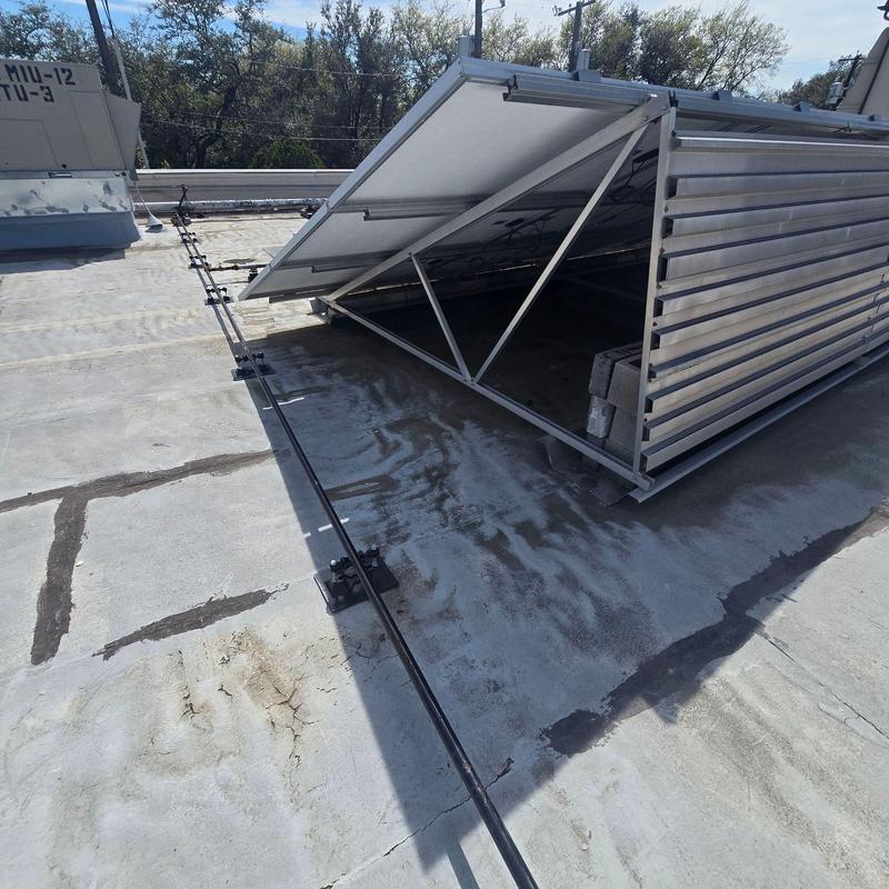 Roof hatch with metal frame and cover on flat roof Roof hatch with metal frame and cover on flat roof