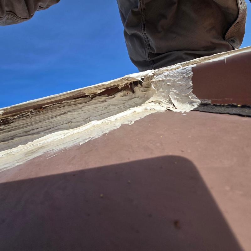 Roof edge wood rot and sealant damage on commercial roof Roof edge wood rot and sealant damage on commercial roof