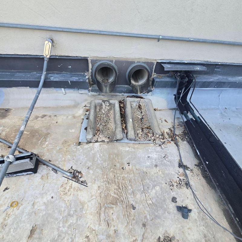 Commercial roof ventilation pipes and debris buildup inspection Commercial roof ventilation pipes and debris buildup inspection