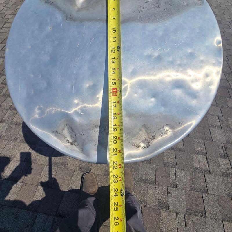 Satellite dish measured with tape on shingled roof Satellite dish measured with tape on shingled roof